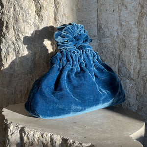 Blue velvet handbag sales