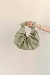 A Bronze Age XL Kimi Croissant Bag in Cotton, Tie Handle A Bronze Age XL Kimi Croissant Bag in Cotton, Tie Handle